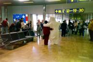 Moomin Troll welcomes the Japanese tourists at the Helsinki Airport